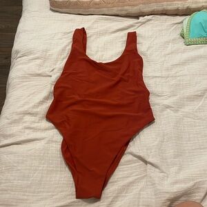 Like new burnt orange medium Aerie one piece! High cut, baywatch style.